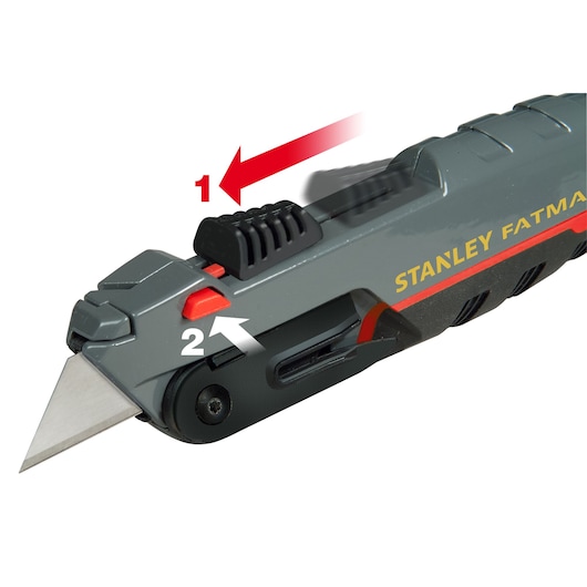 STANLEY 0-10-242 utility knife side view, showing blade release mechanism with red and white direction arrows.