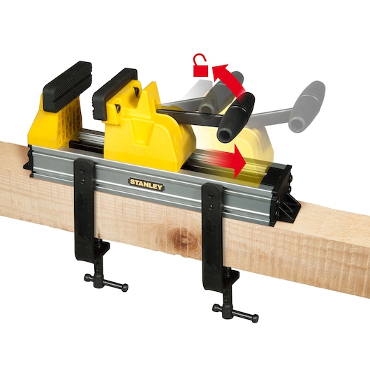 STANLEY 0-83-179 bar clamp photography, yellow and black clamp fixed to wood, side angle.