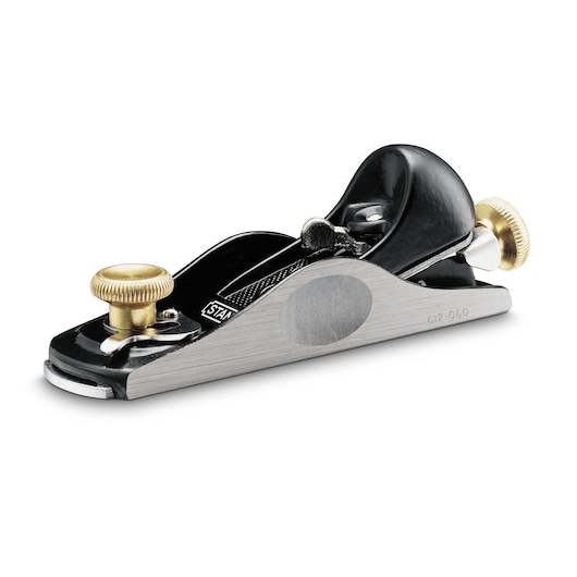 Stanley hand plane tool with gold adjustment knobs on a white background.