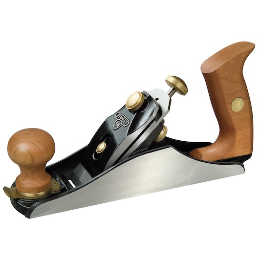 STANLEY 1-12-136 woodworking hand plane, side view, with wooden handles and brass fittings on white background.