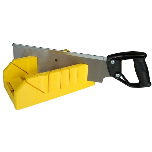 Yellow mitre box with black-handled saw, used for precise angled wood cutting.