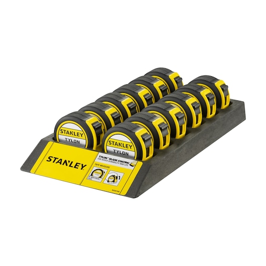 STANLEY 1-30-697 tape measure display, yellow and black tape measures in a countertop tray, front angle.