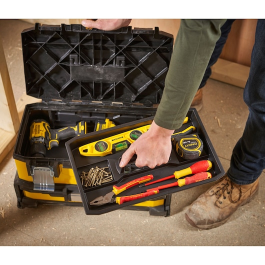 STANLEY 1-95-829 tool box with tray containing hand tools, tape measure, screws, photo from above.