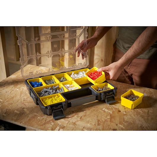 STANLEY 1-97-519 organizer box with yellow compartments for assorted hardware, photo at front angle.