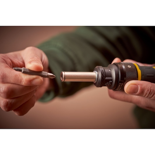 Photo of STANLEY FMHT62692-0 screwdriver handle with bit, close-up view.