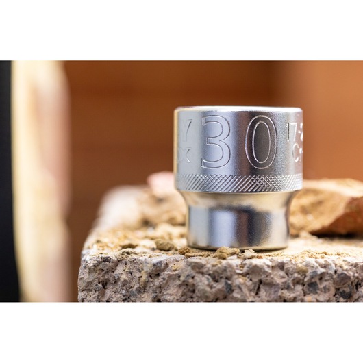 Photo of STANLEY FMMT17242-0 chrome socket, size 30mm, shown on a rough surface.