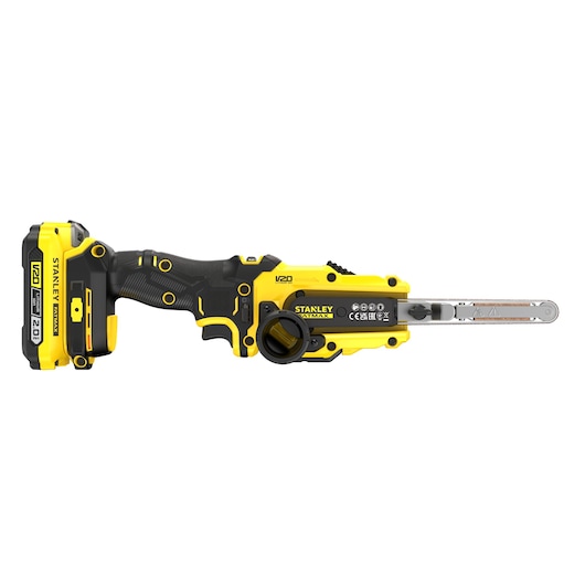 Photo of STANLEY SFMCE210D2 cordless belt file in yellow and black, side angle, with V20 20V battery.