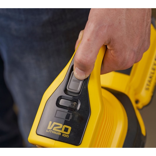 STANLEY SFMCVS001D1 yellow V20 Lithium Ion vacuum handle close-up, showing power switch.