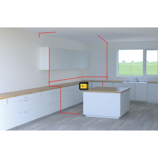 STANLEY STHT77502-1 laser level on kitchen island, projecting red lines in modern white kitchen, front angle.