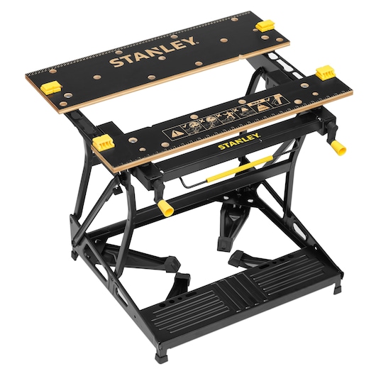 STANLEY STST83800-1 folding workbench with black and yellow accents, shown at an angled front view on white background.