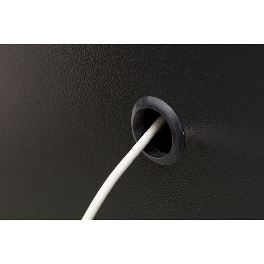 STANLEY STST97957-1 close-up photo of cable management hole with white cable, product category: photography.